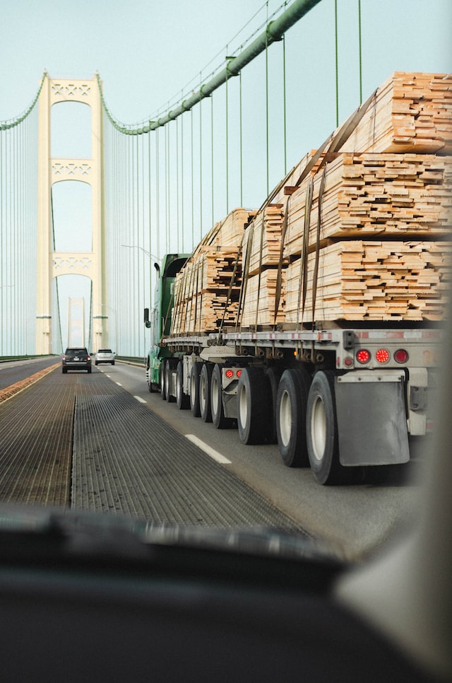 Freight trucking crossing bridge