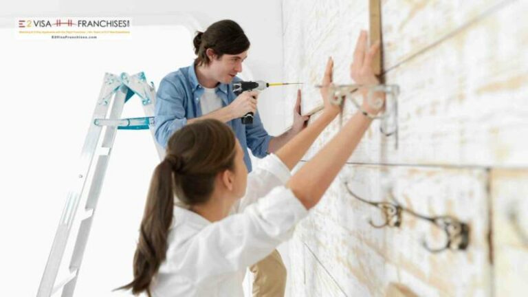 A home improvement franchise employees measuring and drilling a wall