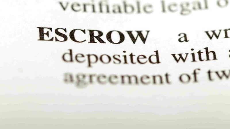 An agreement with escrow written in bold