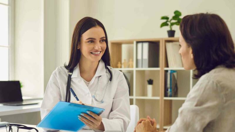 A doctor talking to a patient