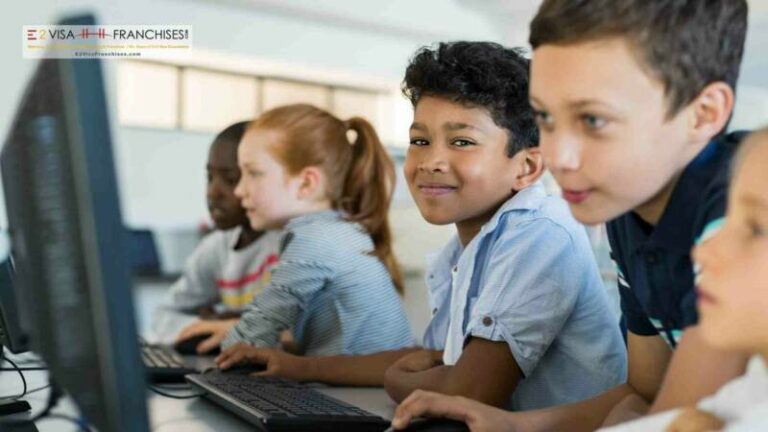 Children in a school in the US looking at computers