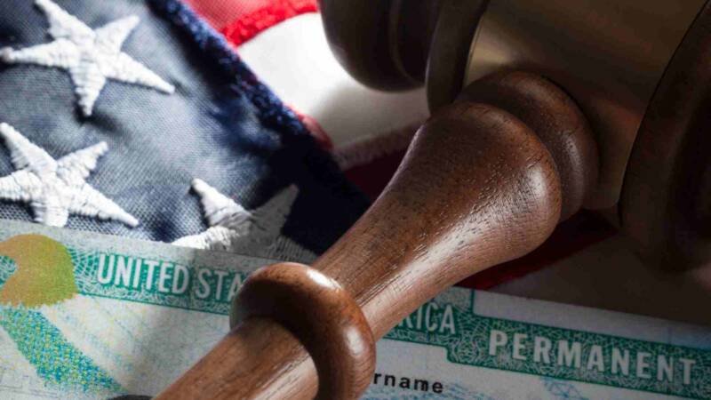 A permanent residency card with US flag