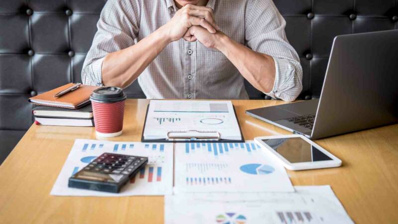 A man analyzing data of financial report